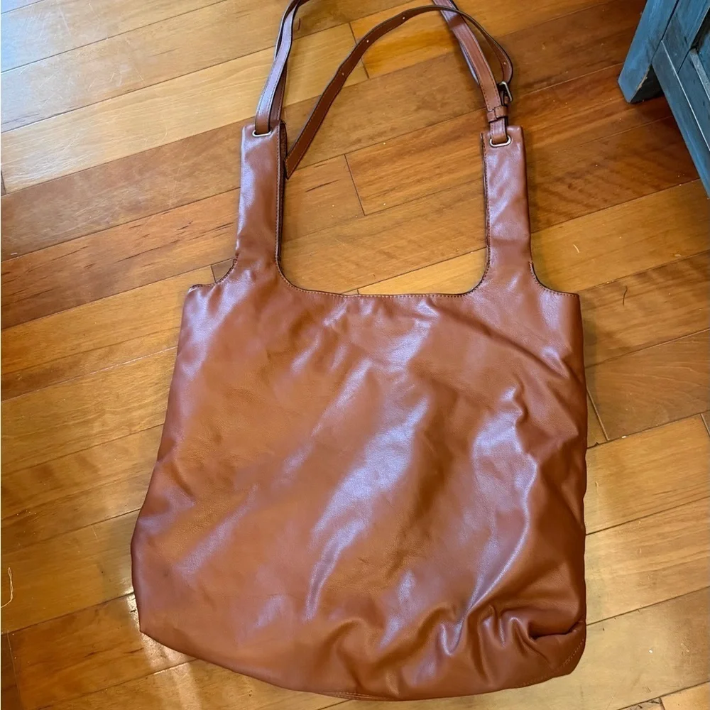 Zara faux leather handbag, adjustable straps, and very roomy.